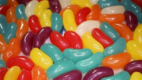 Yelly bean beans closeup texture rotating video background Stock Footage 113143199
