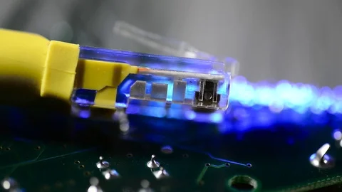 Yelow internet switch on circuit board close up macro Stock Footage 111130030