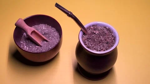 Yerba Mate drink on Yellow Background Vídeo Stock 304300004