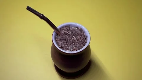 Yerba Mate drink on Yellow Background Stock Footage 304300144
