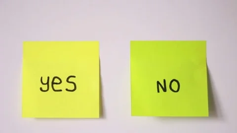 "Yes" and "No" labeled on two stickers Stock Footage 84885165