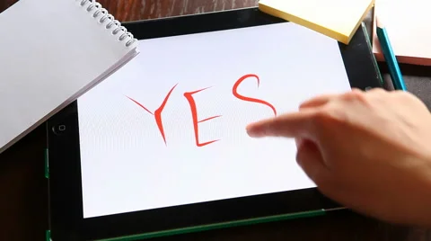 Yes - Hand writing word on tablet with white background Stockbeeldmateriaal 63140112