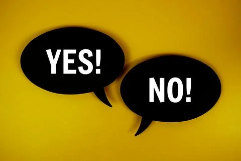 Yes or No text on speech bubble top view on yellow background Stock Photos