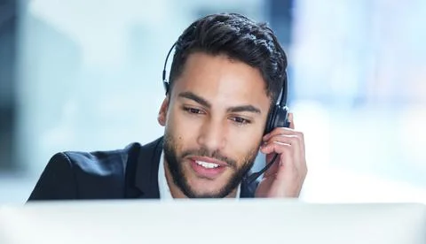 Yes we do help with those problems. Shot of a young businessman working in a  Stock Photos