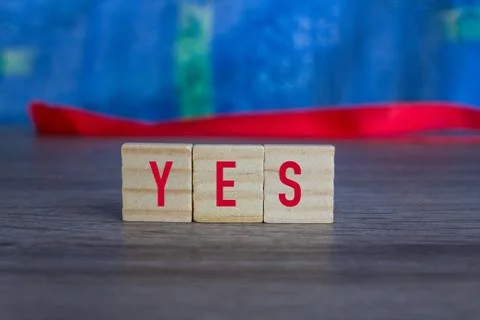 YES , on wood cube Stock Photos