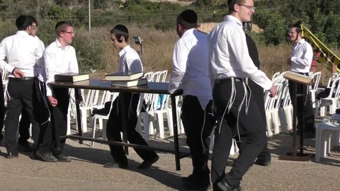 Yeshiva students getting ready to study the Talmud outside military Prison 6 Video stock 81746950