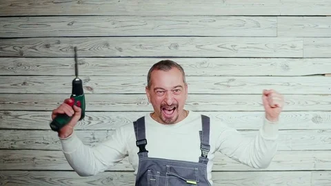 Yfppy construction worker with drill in his hand 스톡 동영상 84066899