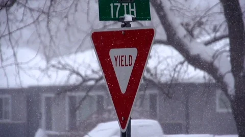 Yield Sign in snow 스톡 동영상 90784768