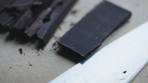Yil Close-Up of Chopping Dark Chocolate Stock Footage 326651142