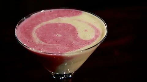 Yin and yang cocktail on the table. Stock Footage 80309364