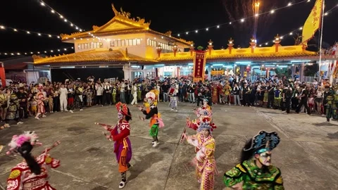 Yingge Dancers Perform During Deity Celebration at Seng Fatt Temple, Kampar Stock Footage 345444738