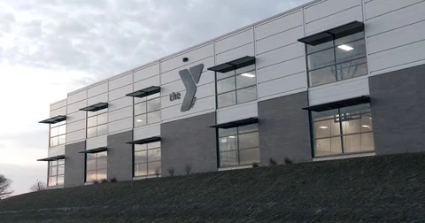 YMCA - Exterior - Dusk - Windows Stock Footage 72713147