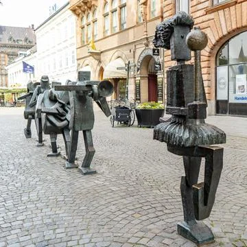 Yngve Lundell's The Optimistic Orchestra captivating sculptures in Malmo Stock Photos