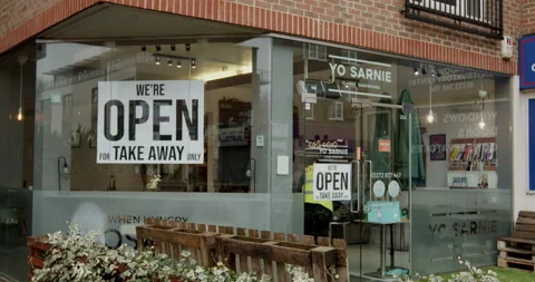 Yo Sarnie cafe, due to Covid-19 restrictions displaying open for take away only Stock Footage
