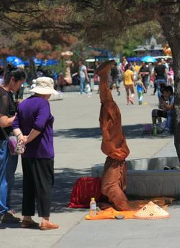 Yog is standing on his head in Harbin, China Stock Photos