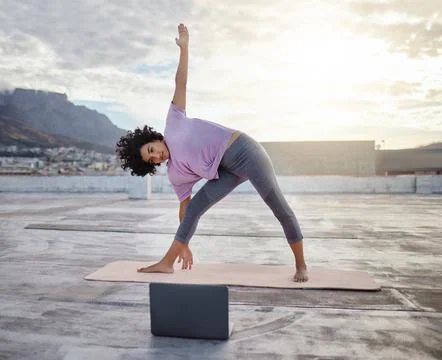Yoga, balance and online tutorial with black woman fitness or exercise workout Foto stock