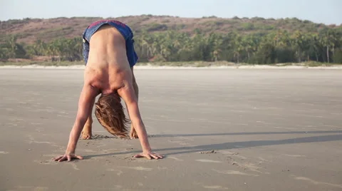 Yoga on the beach Stock Footage 56176668