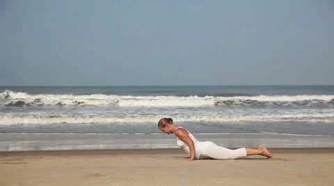 Yoga on the beach Stock Footage 56177421