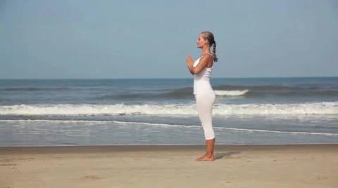 Yoga on the beach Stock Footage 56178330