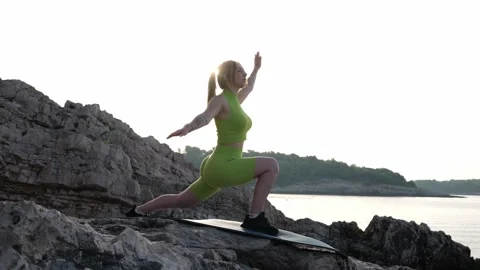 Yoga on the beach Stock Footage 249461697