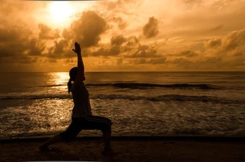 Yoga on beach Stock Photos