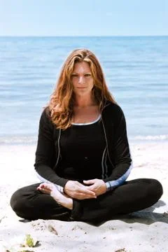 Yoga at the beach Stock Photos