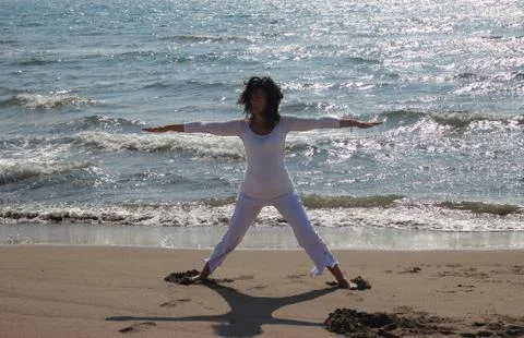 Yoga on the beach Stock Photos