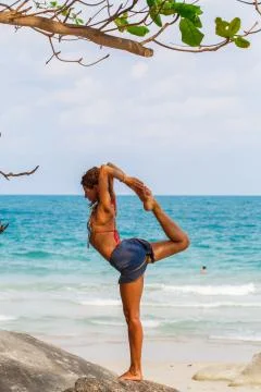 Yoga on the beach Stock Photos