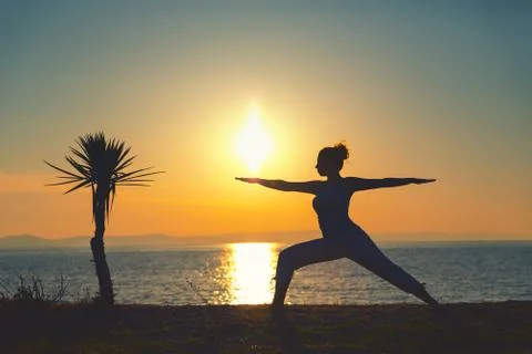 Yoga on the beach. 스톡 사진