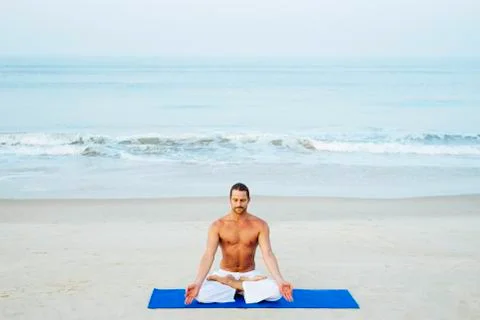 Yoga on the beach 스톡 사진
