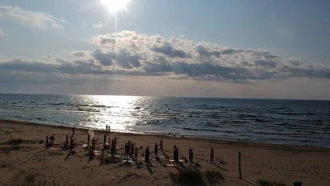 Yoga class on the beach Stock Footage 113045452