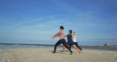 Yoga Class on Beach, Slow Motion Stock Footage 104509927