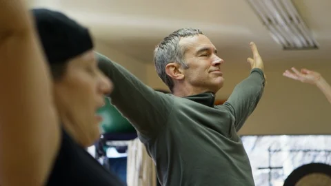 Yoga Class Instructor Old People Fitness Exercise Healthy Lifestyle 4K Video stock 104639987