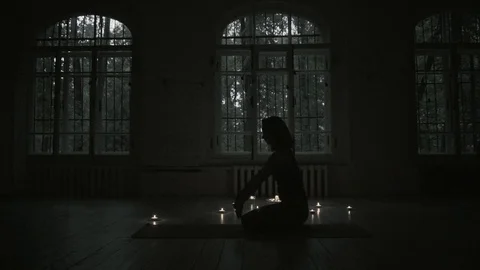 Yoga in darkness start Stock Footage 92128355