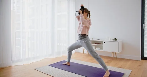 Yoga exercises with virtual reality set Stock Footage 122235448
