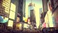 Yoga fans against the background of billboards and sky-scrapers in Times Square HD Footage