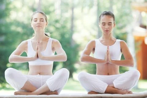 Yoga group training at park Stock Photos