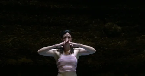 A yoga instructor on a paddle board inside a hot springs crater in Heber, Utah. Stock Footage 114248621
