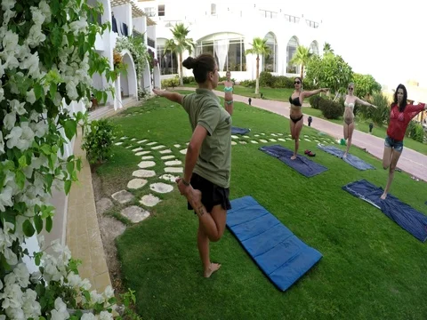 Yoga lessons at the hotel initial stretching Video stock 73889316