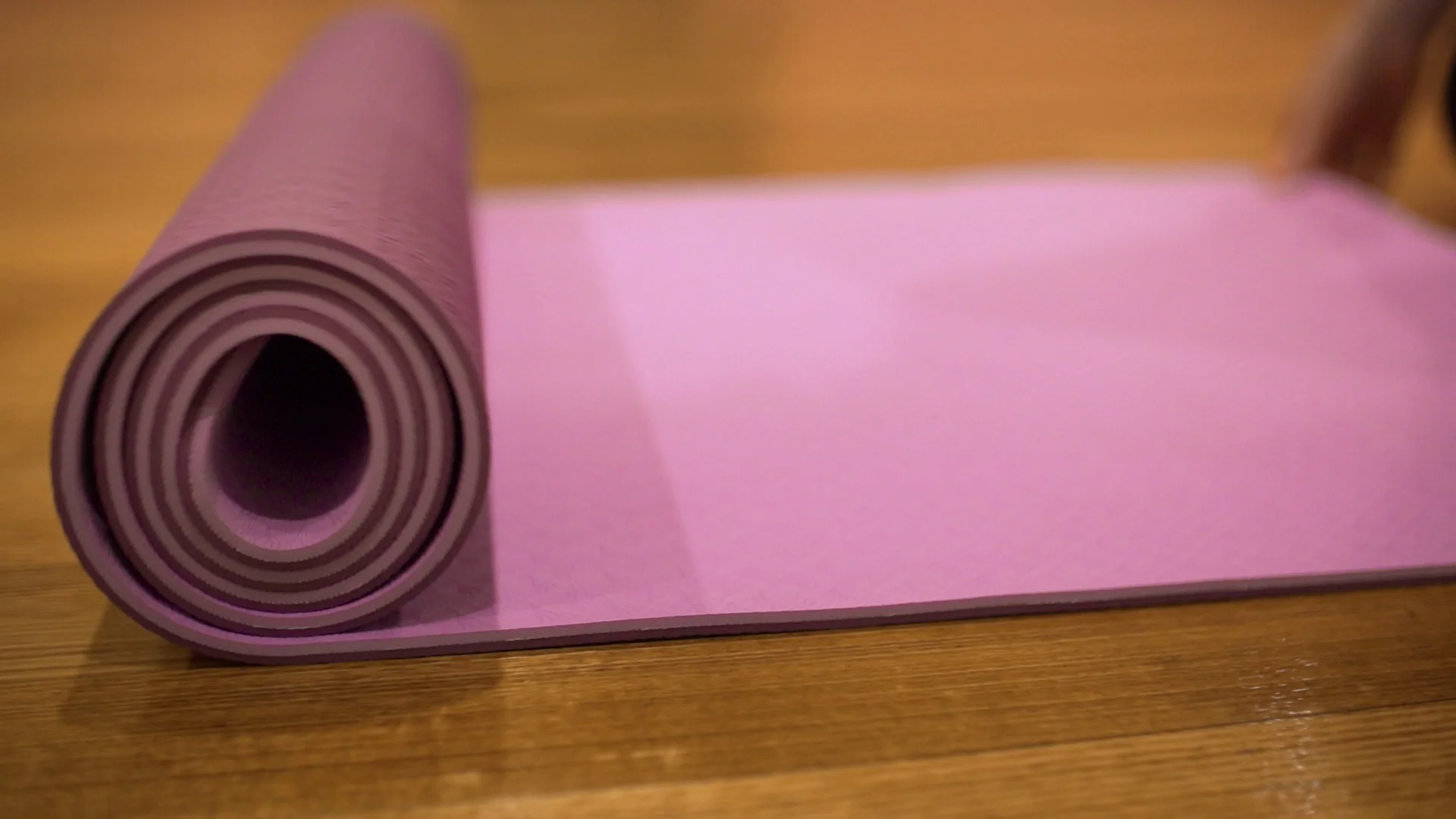 A Yoga Mat rolling out in a pilates stud, Stock Video