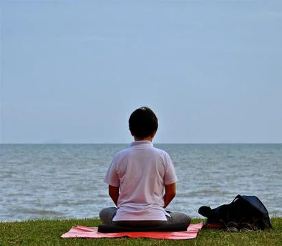 Yoga at the ocean Stock Photos