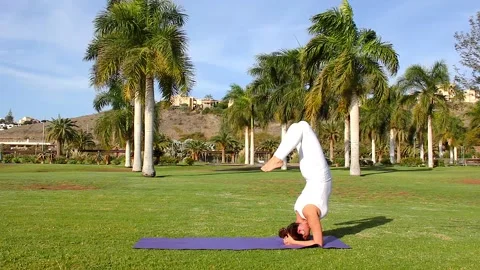 Yoga park dwi pada viparita dandasana by Josu Ozkaritz Stock Footage