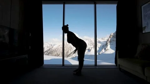 Yoga practice in the room with mountain view Stock Footage 171622794