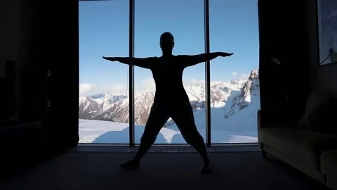 Yoga practice in the room with mountain view Stock Footage 171622897