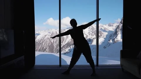 Yoga practice in the room with mountain view Stock Footage 171623036