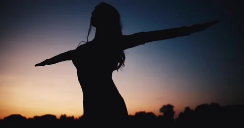Yoga practice silhouette on a background of the sun Stock Footage 130543837