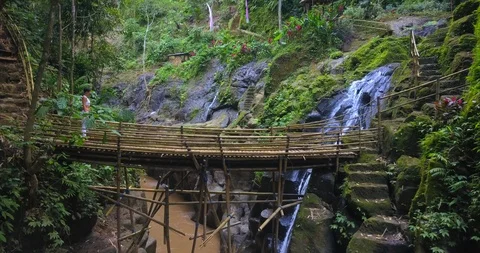 Yoga practicing at waterfall Stock Footage 92966861