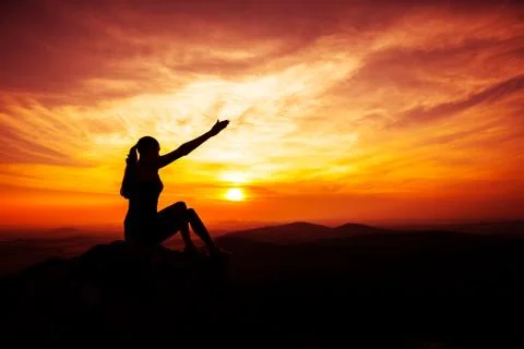 Yoga practicioner in sunset Stock Photos