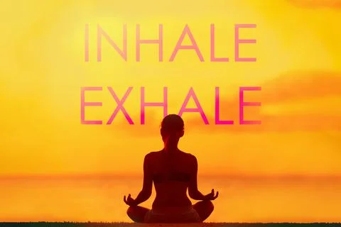 Yoga quote INHALE EXHALE for breathing meditation concept. Silhouette of woman Stock Photos