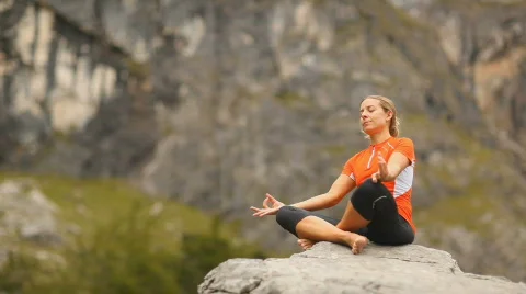Yoga on rock Stock Footage 525599